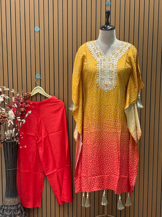 Add vibrant flair to your wardrobe with these kaftan-style printed kurtas