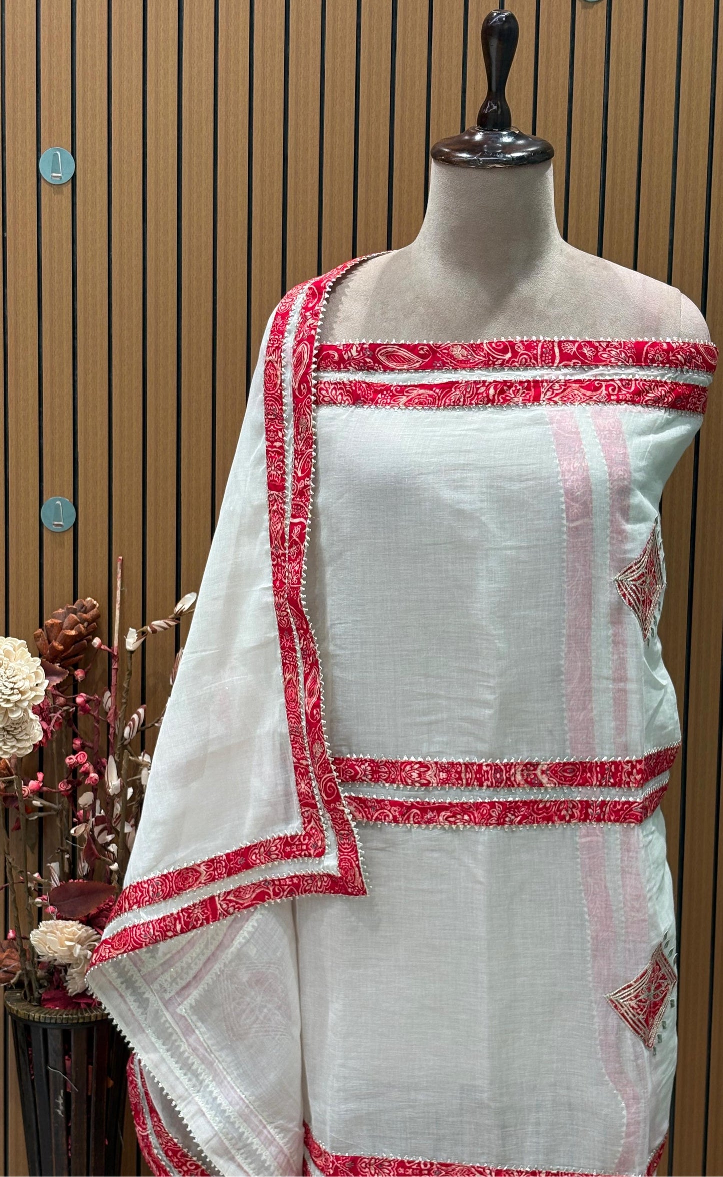 Unveil timeless elegance with our unstitched suit set