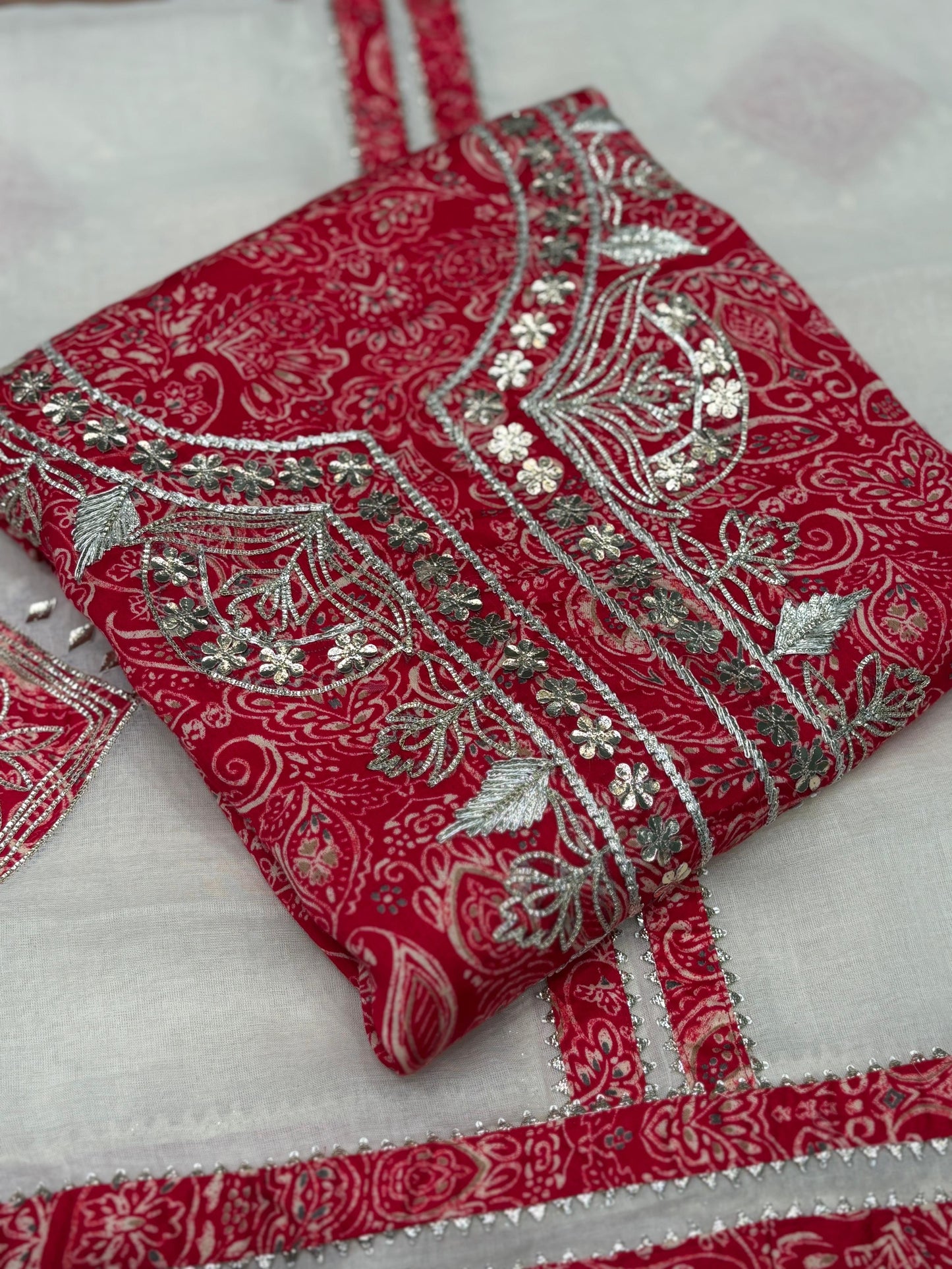 Unveil timeless elegance with our unstitched suit set