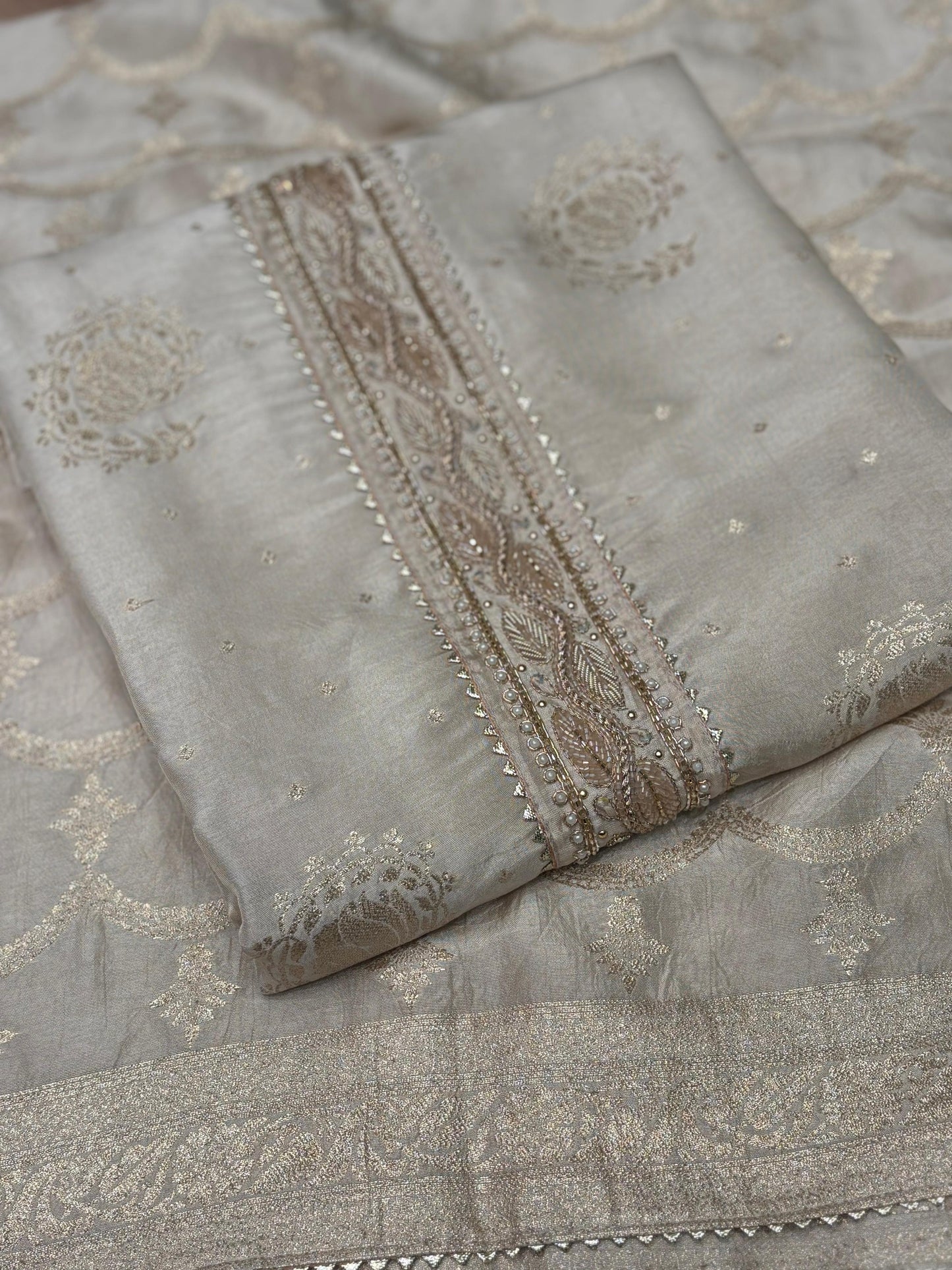 Indulge in regal elegance with our luxurious unstitched suit set
