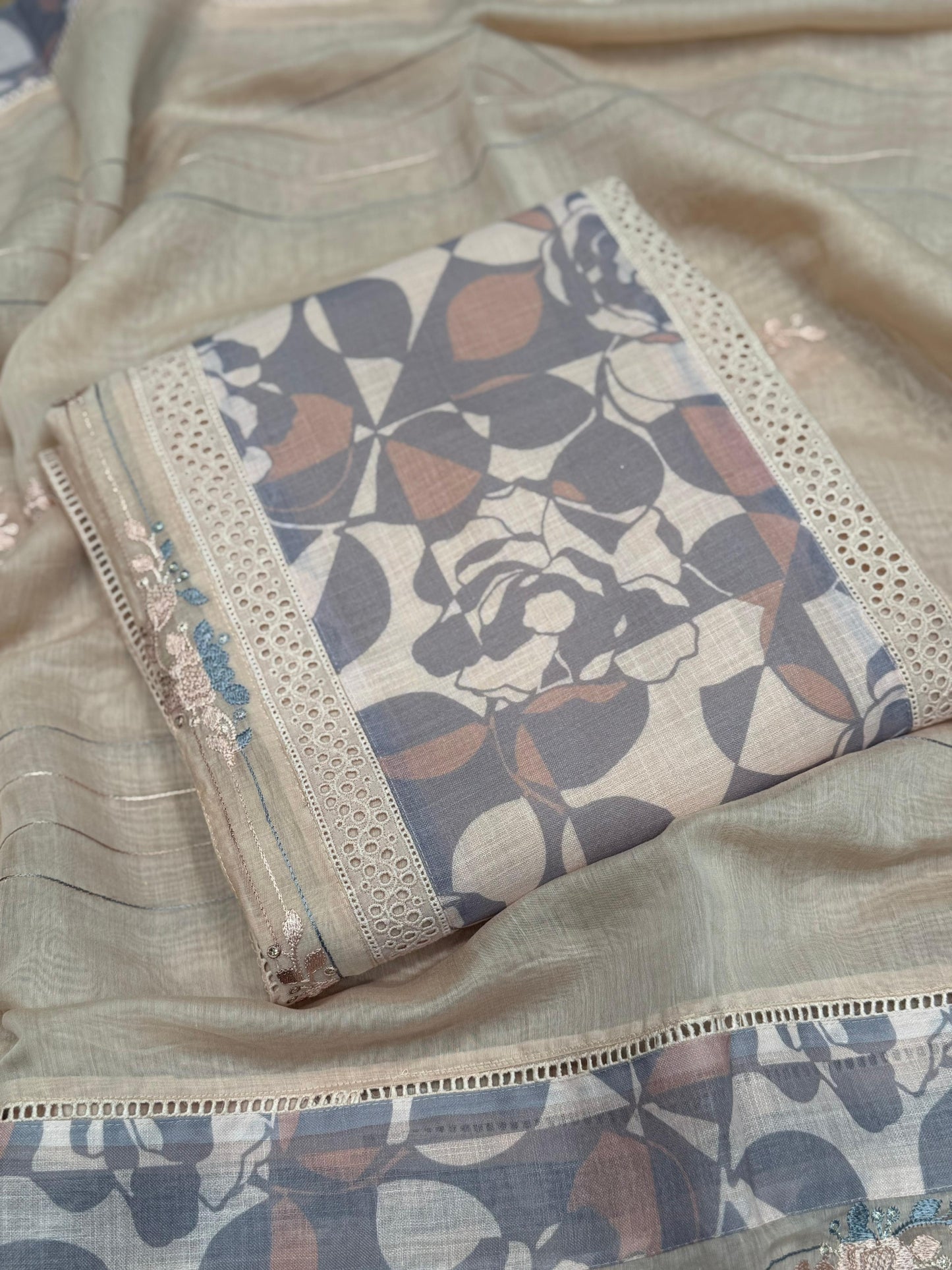 Step into elegance with our premium unstitched suit set