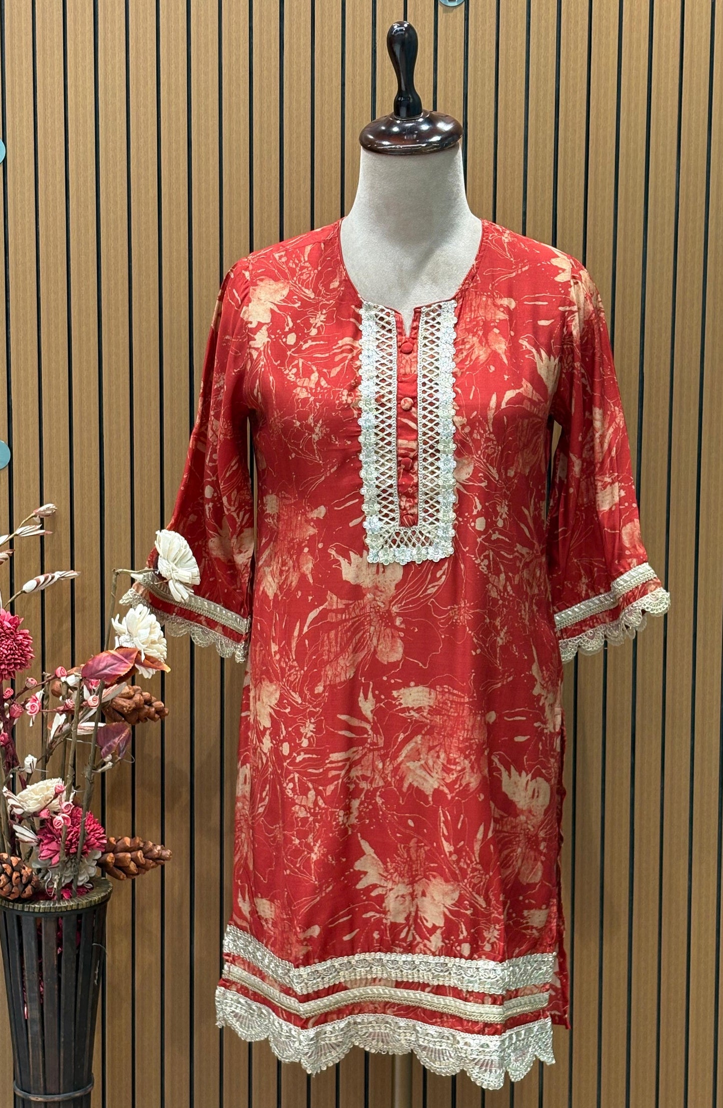 Make a bold style statement with this vibrant red cord-set