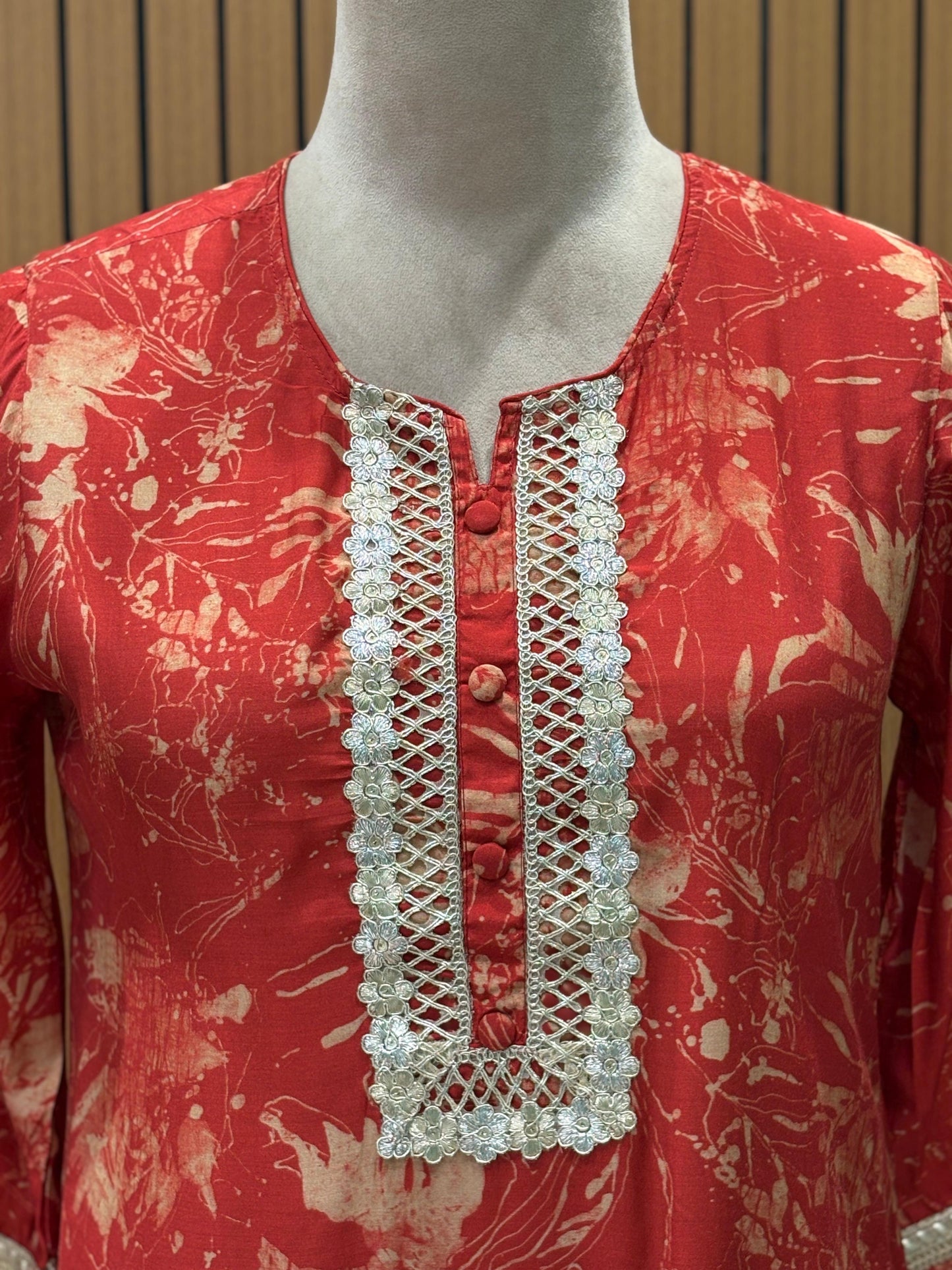 Make a bold style statement with this vibrant red cord-set