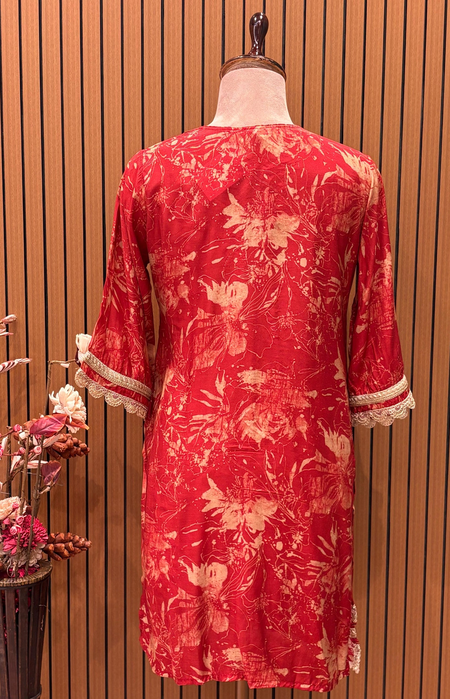 Make a bold style statement with this vibrant red cord-set