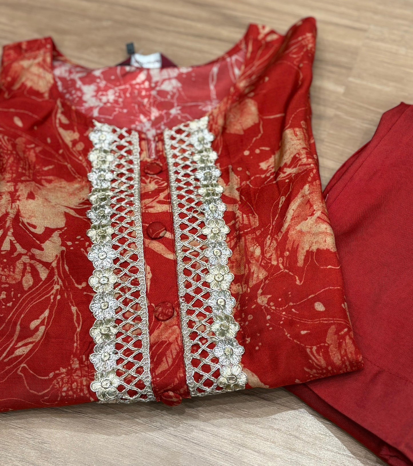 Make a bold style statement with this vibrant red cord-set