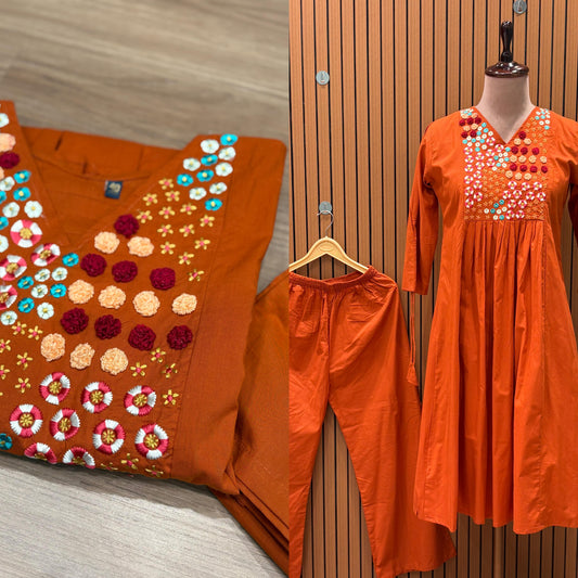 Brighten your wardrobe with this vibrant orange A-line kurti set