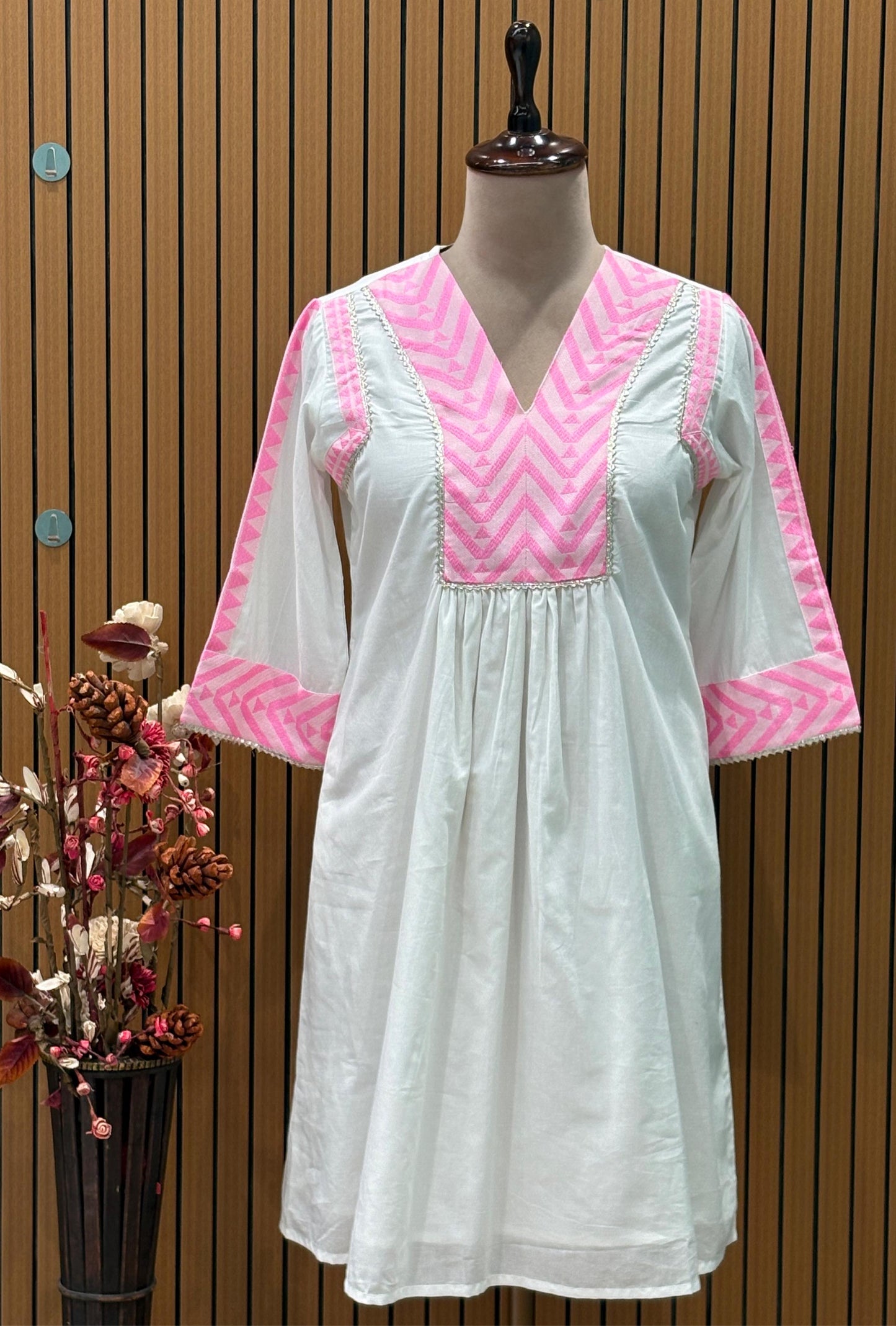 Elevate your summer style with this elegant white cotton cord-set