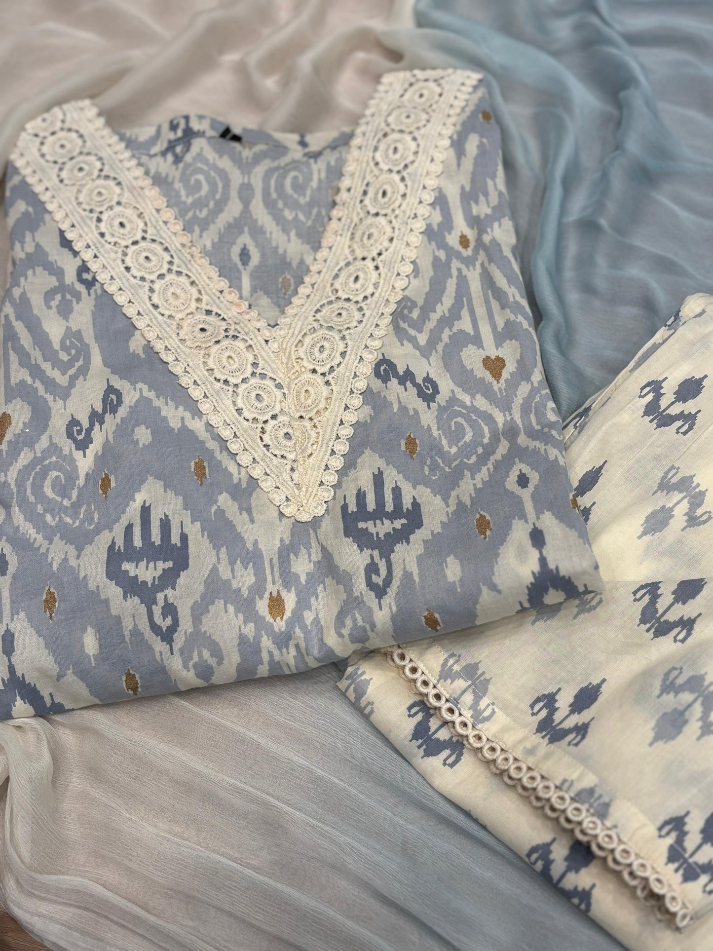 Grace your look with this soft pastel kurti set