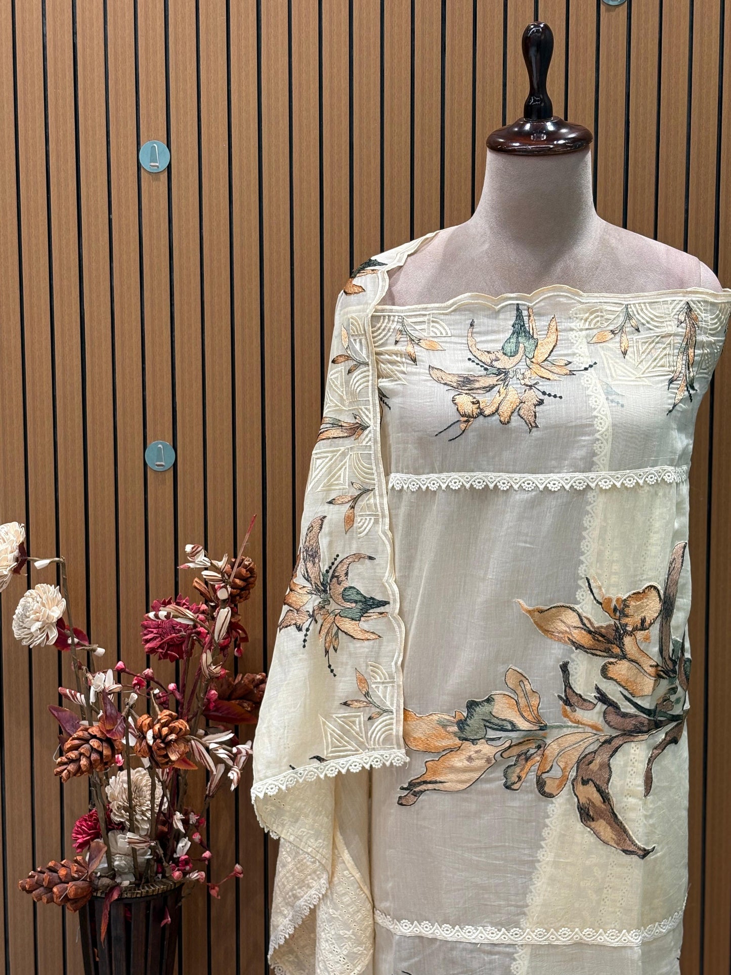 Elevate your ethnic wardrobe with this elegant unstitched suit