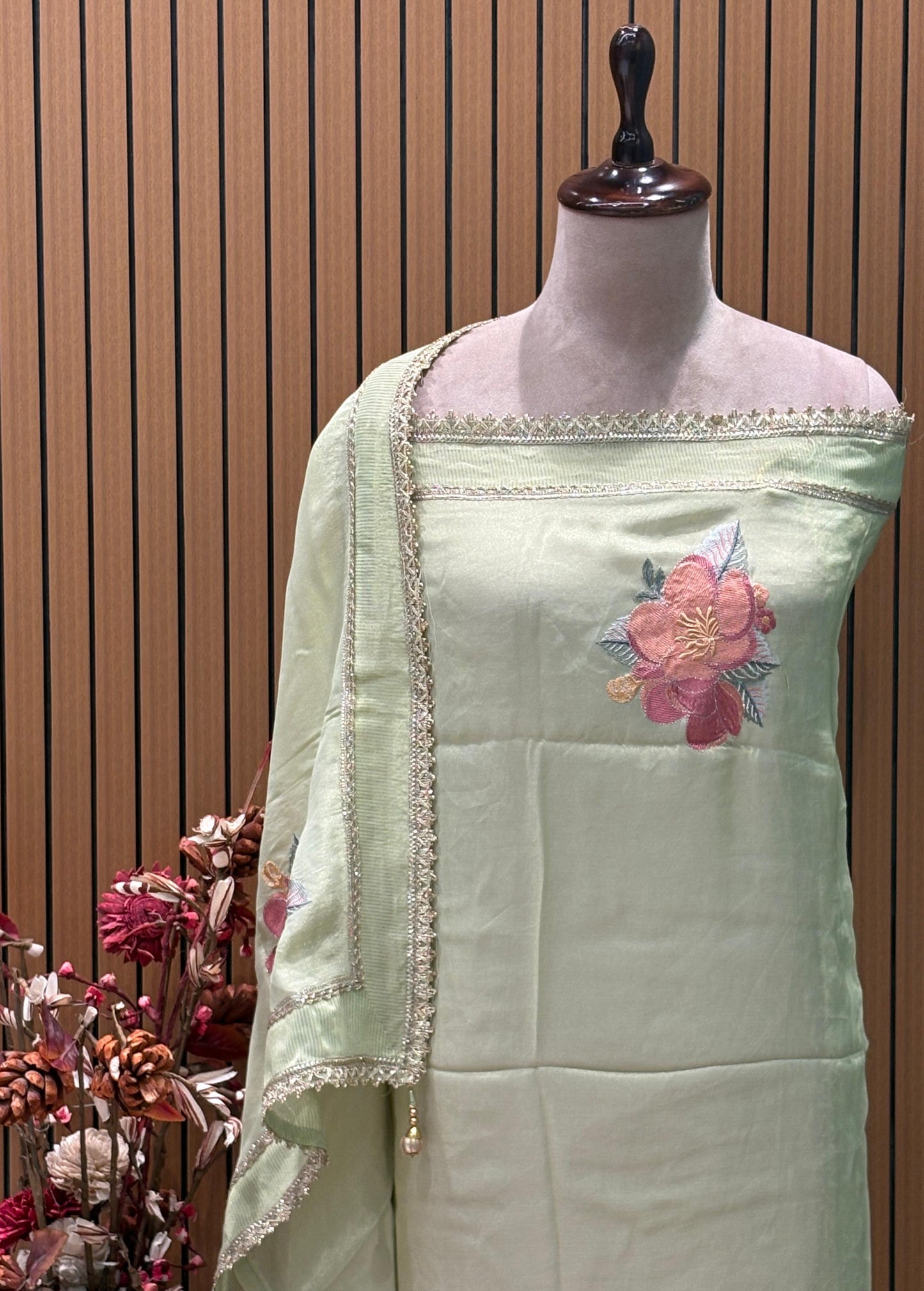 Grace meets glamour in our exquisite unstitched suit set