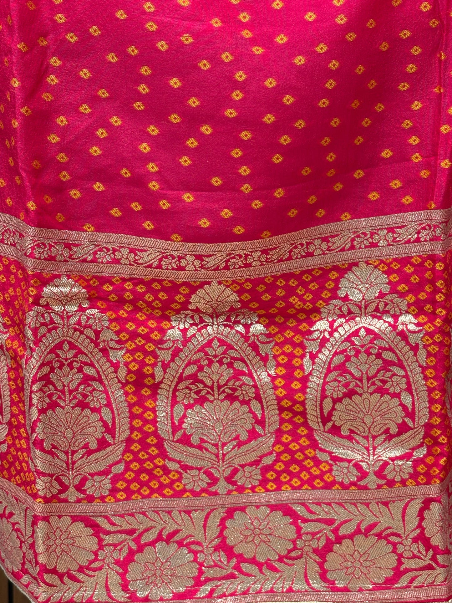 Add a regal charm to your festive wardrobe with this unstitched suit