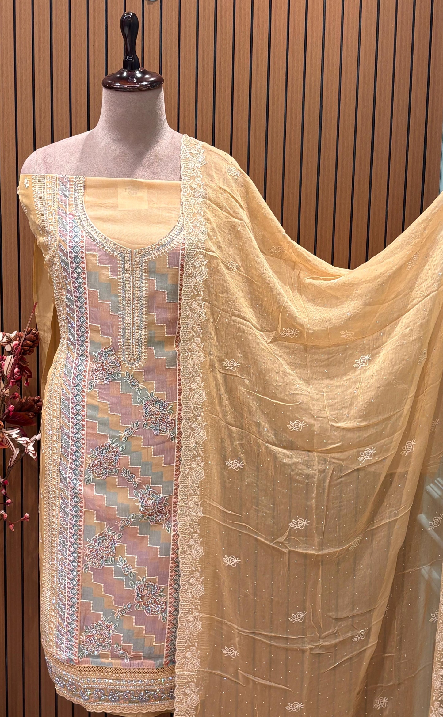 Presenting an elegant unstitched suit set in a soothing mustard-gold hue