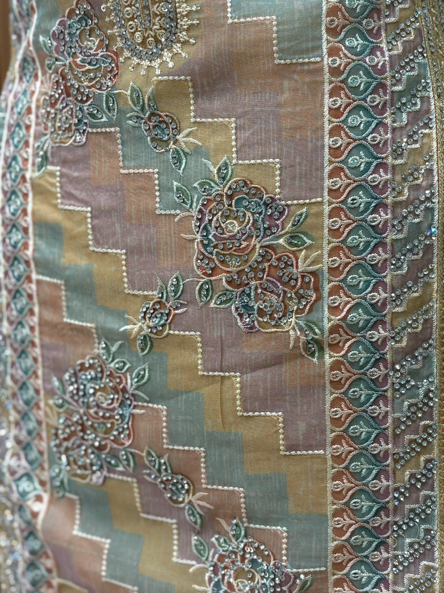 Presenting an elegant unstitched suit set in a soothing mustard-gold hue