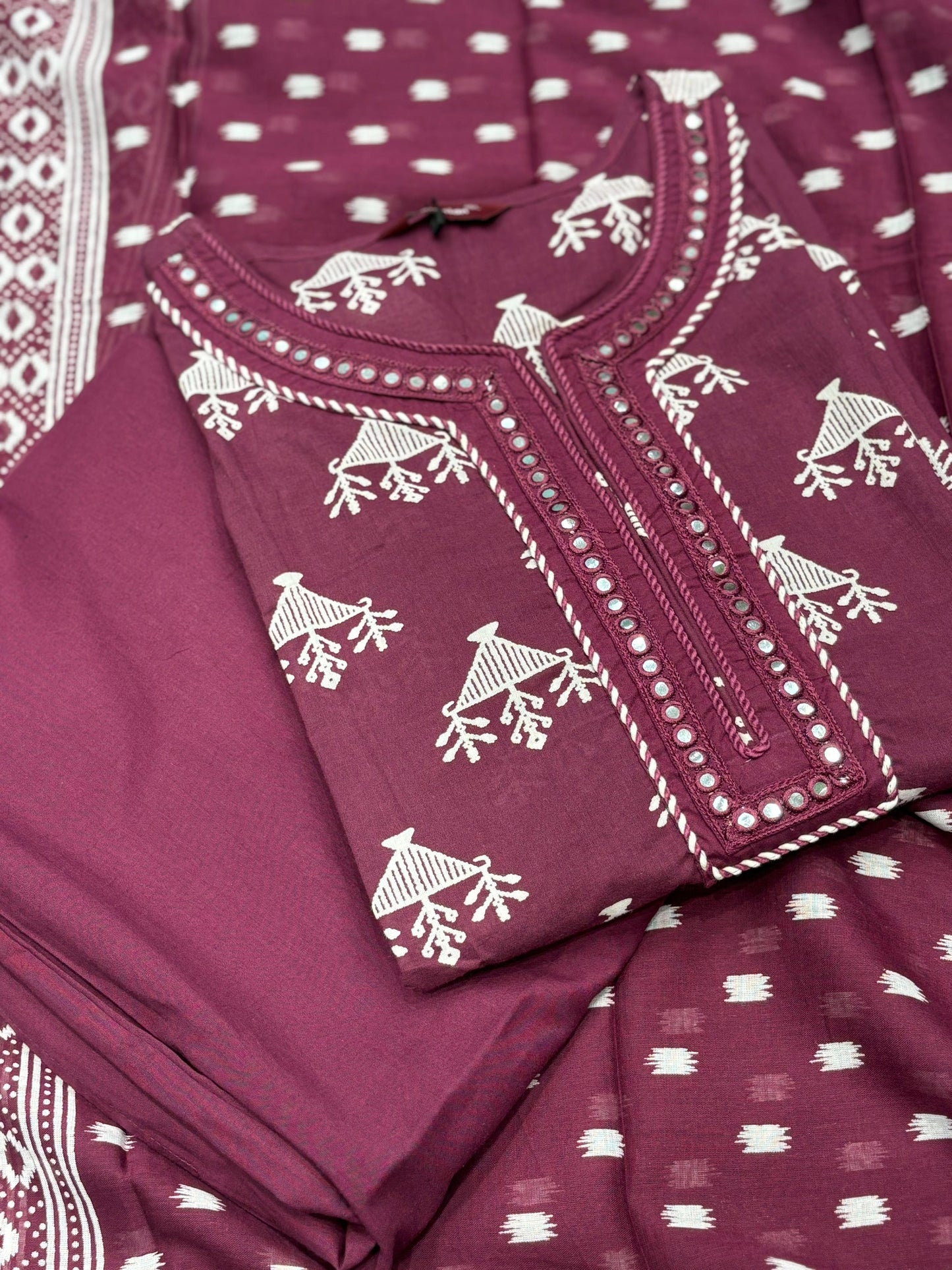 Brighten your wardrobe with this vibrant cotton suit set