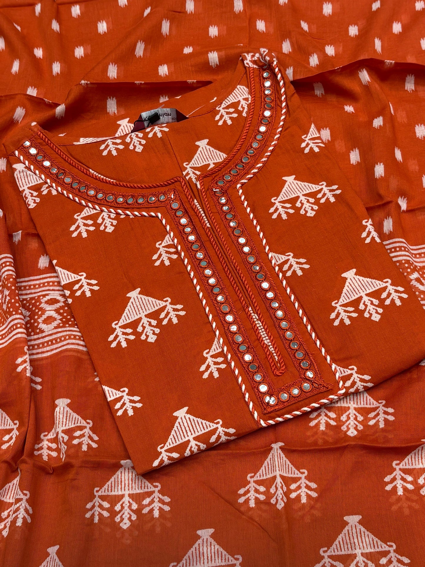 Brighten your wardrobe with this vibrant cotton suit set