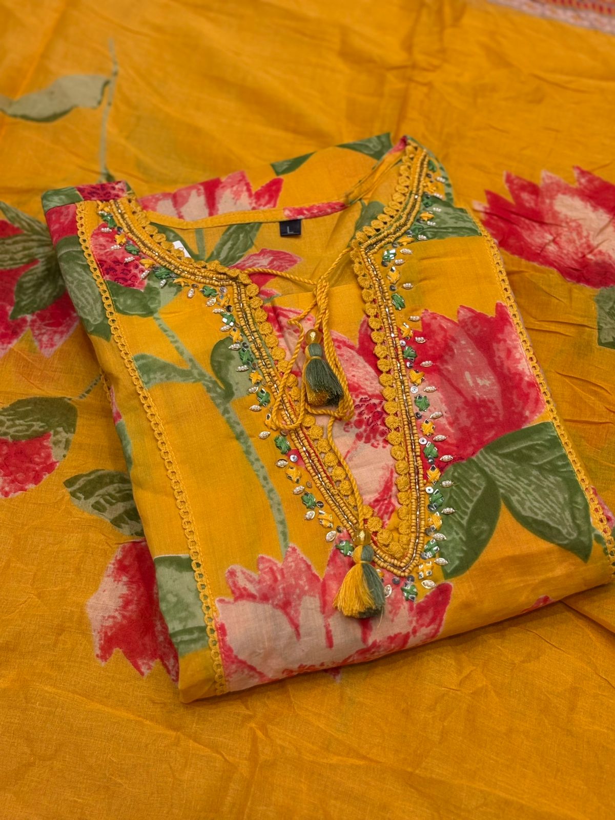 Brighten your festive wardrobe with this vibrant yellow A-line suit
