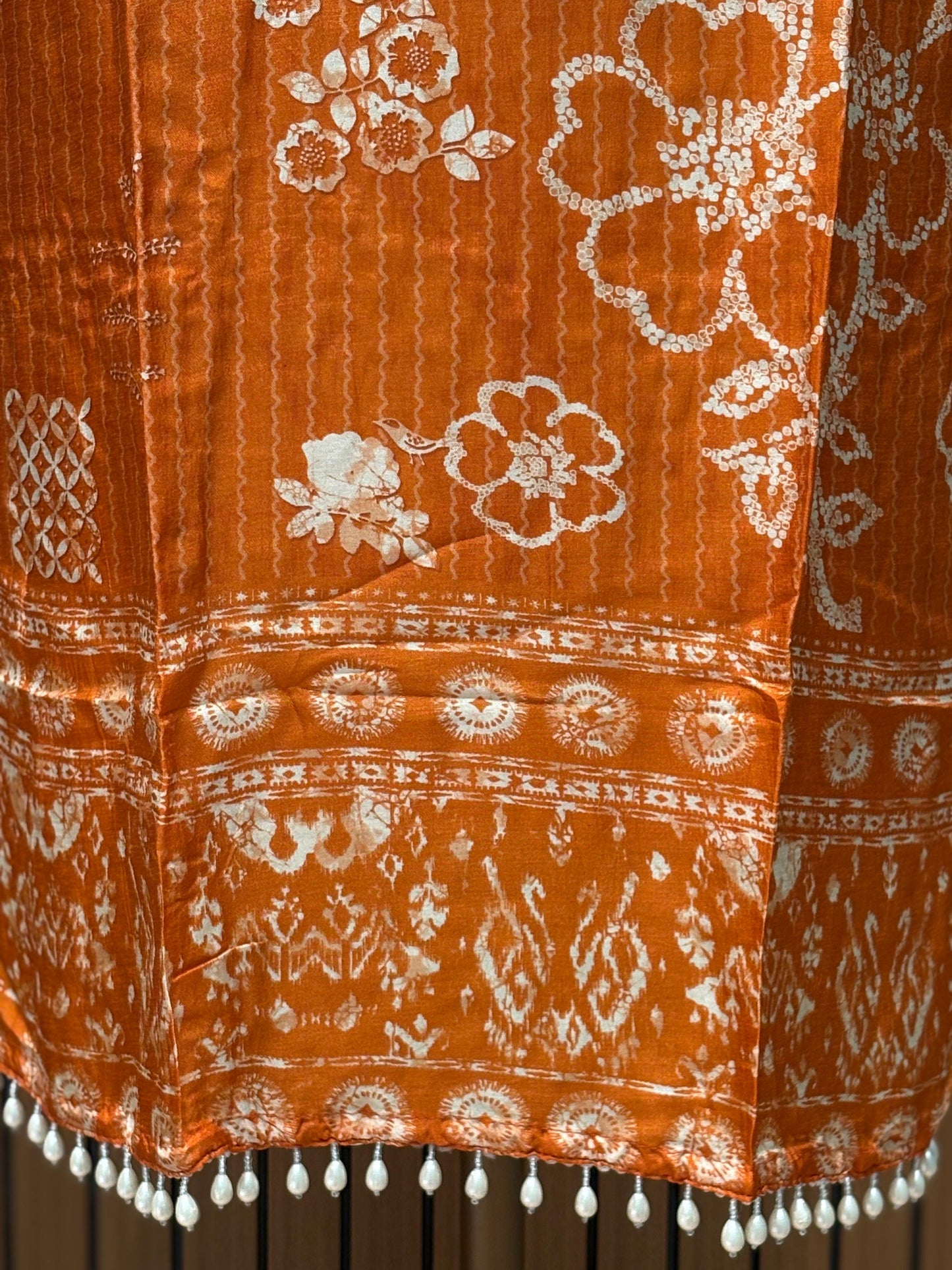 Orange cotton suit with shell mirror work neckline