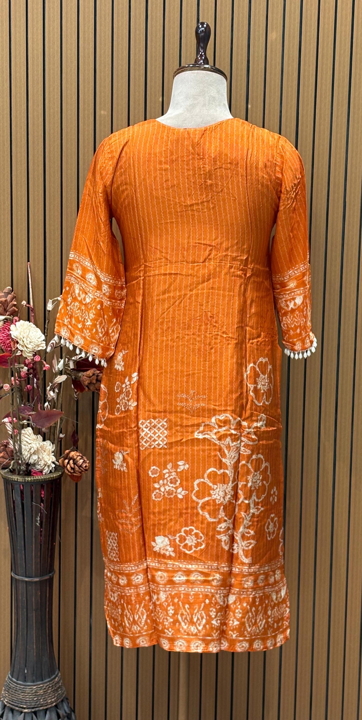 Orange cotton suit with shell mirror work neckline