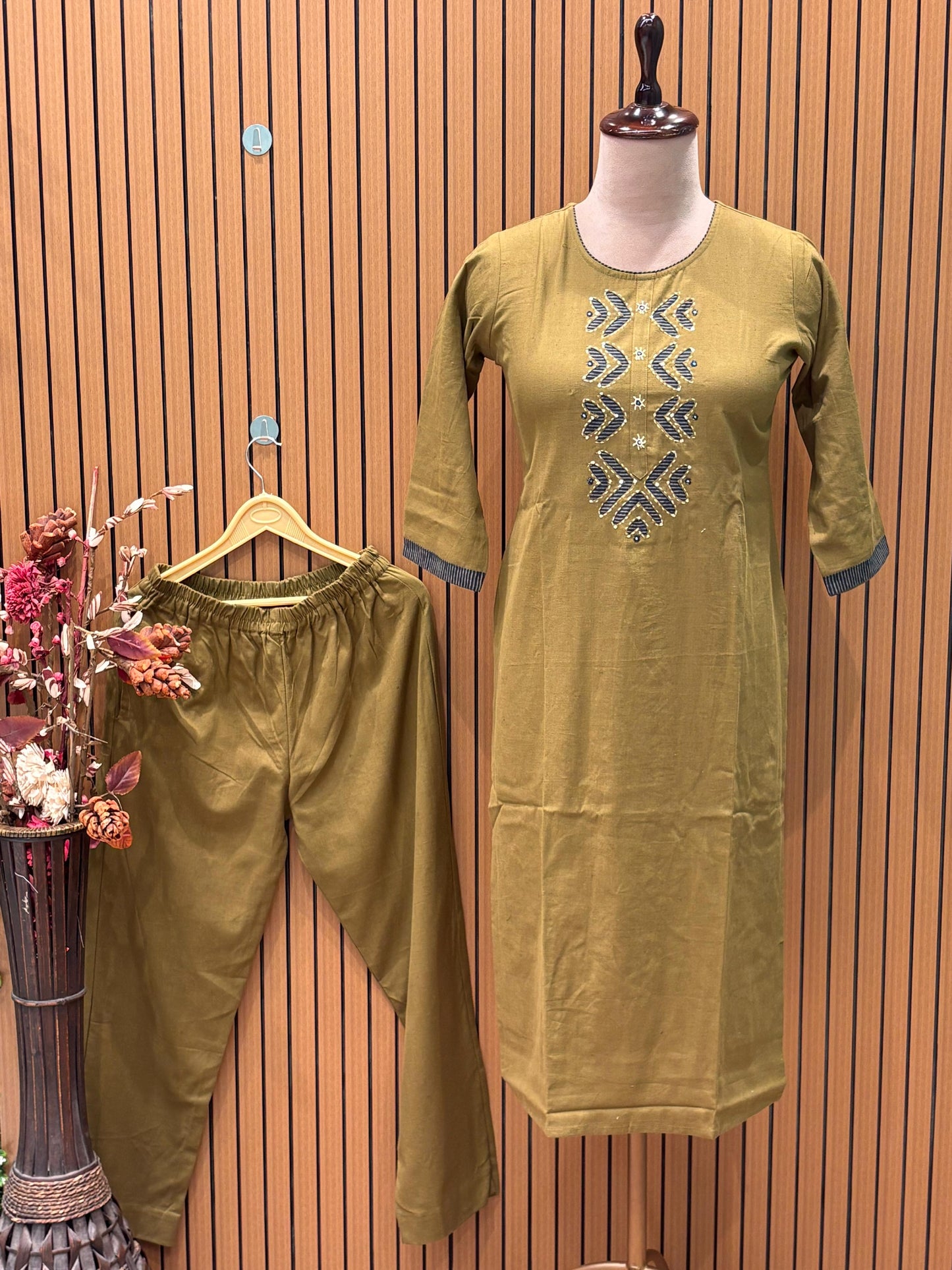 Grace meets comfort in this mustard cotton kurta set