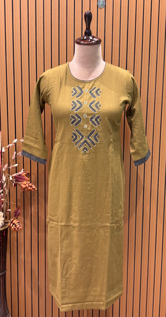 Grace meets comfort in this mustard cotton kurta set