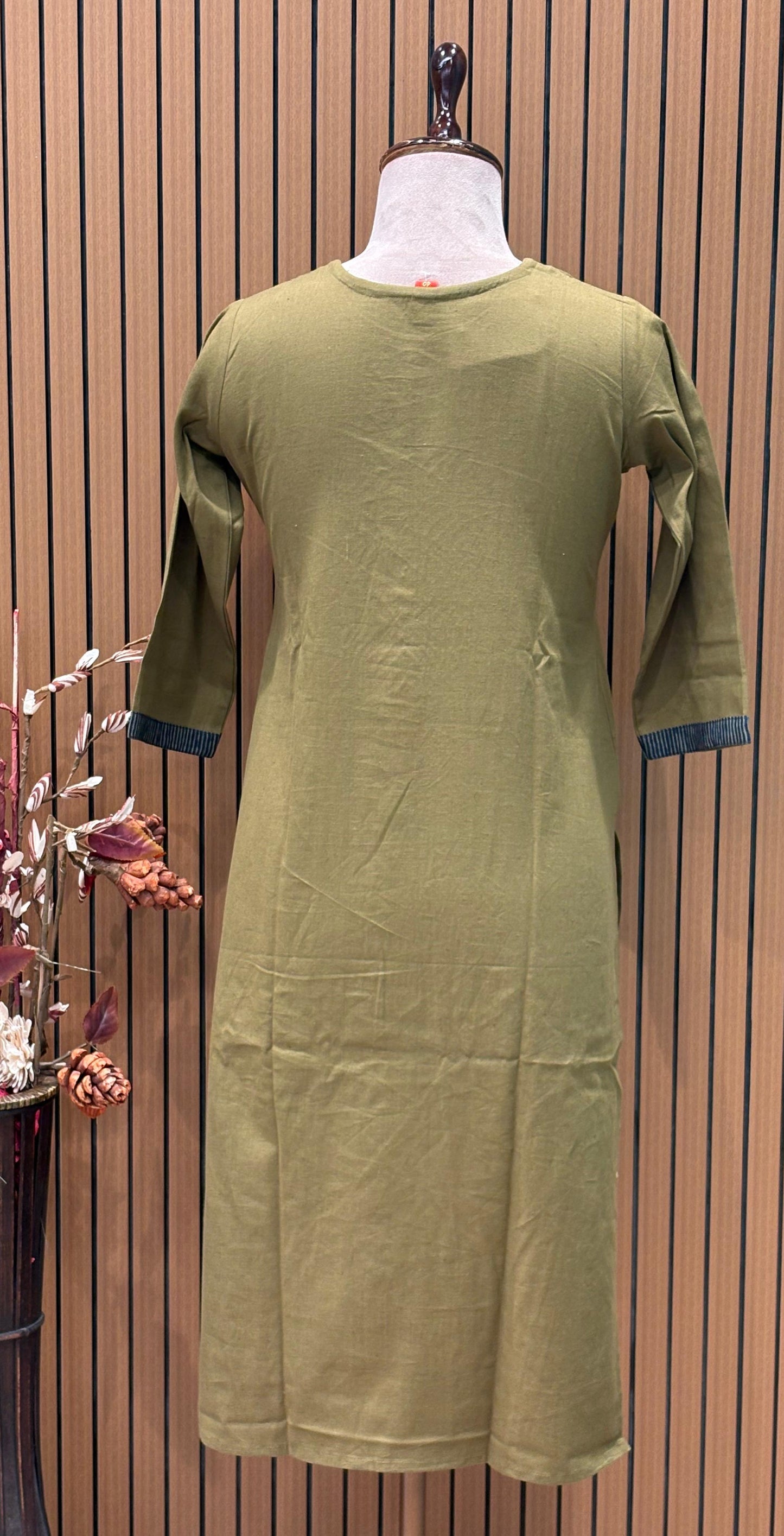 Grace meets comfort in this mustard cotton kurta set