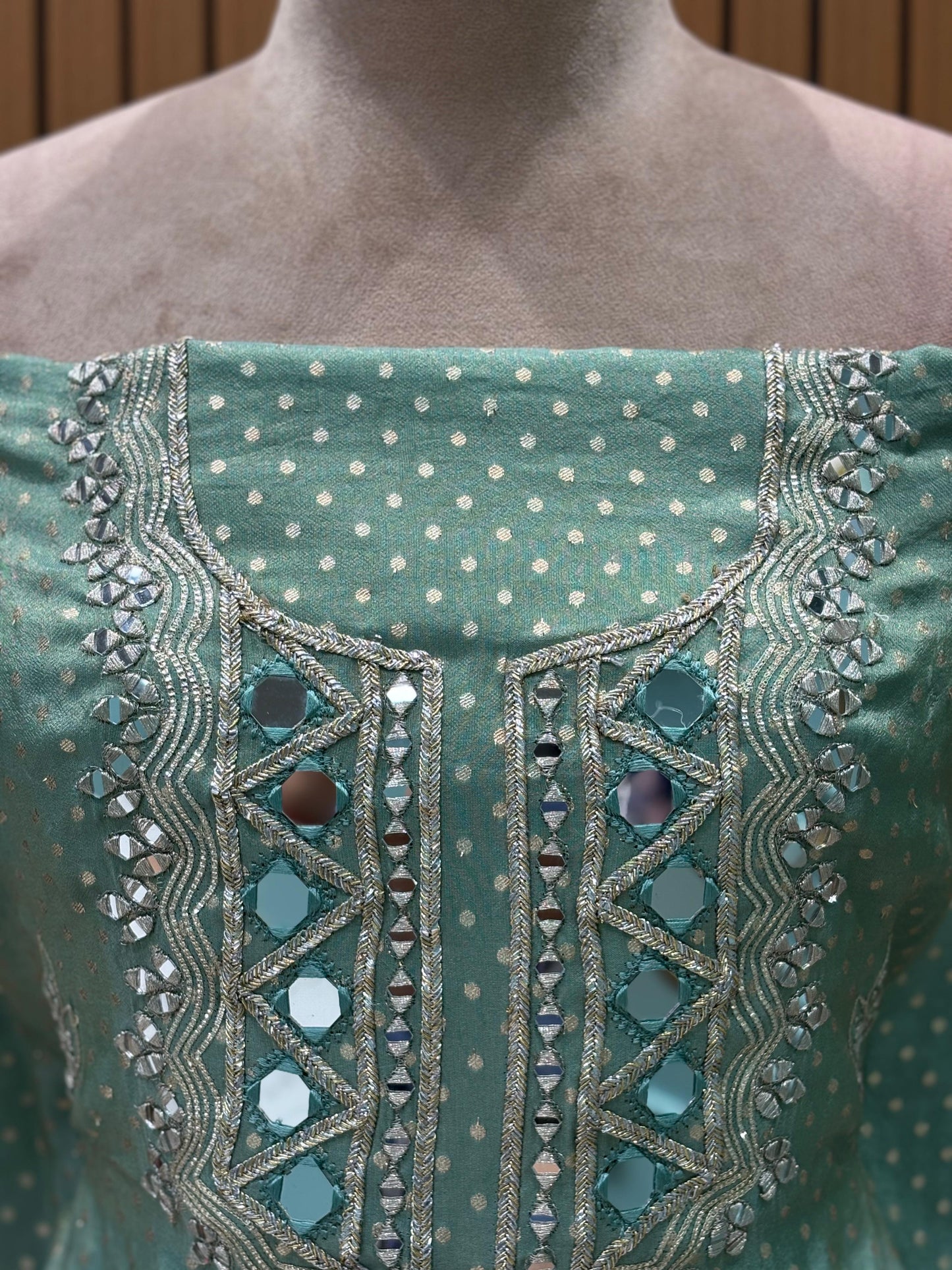 Elevate your festive wardrobe with this exquisite ensemble crafted