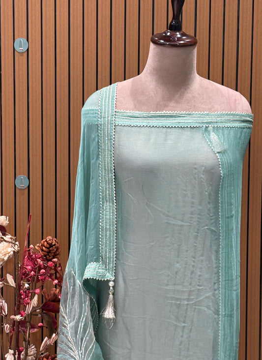 Elevate your festive wardrobe with this exquisite ensemble crafted