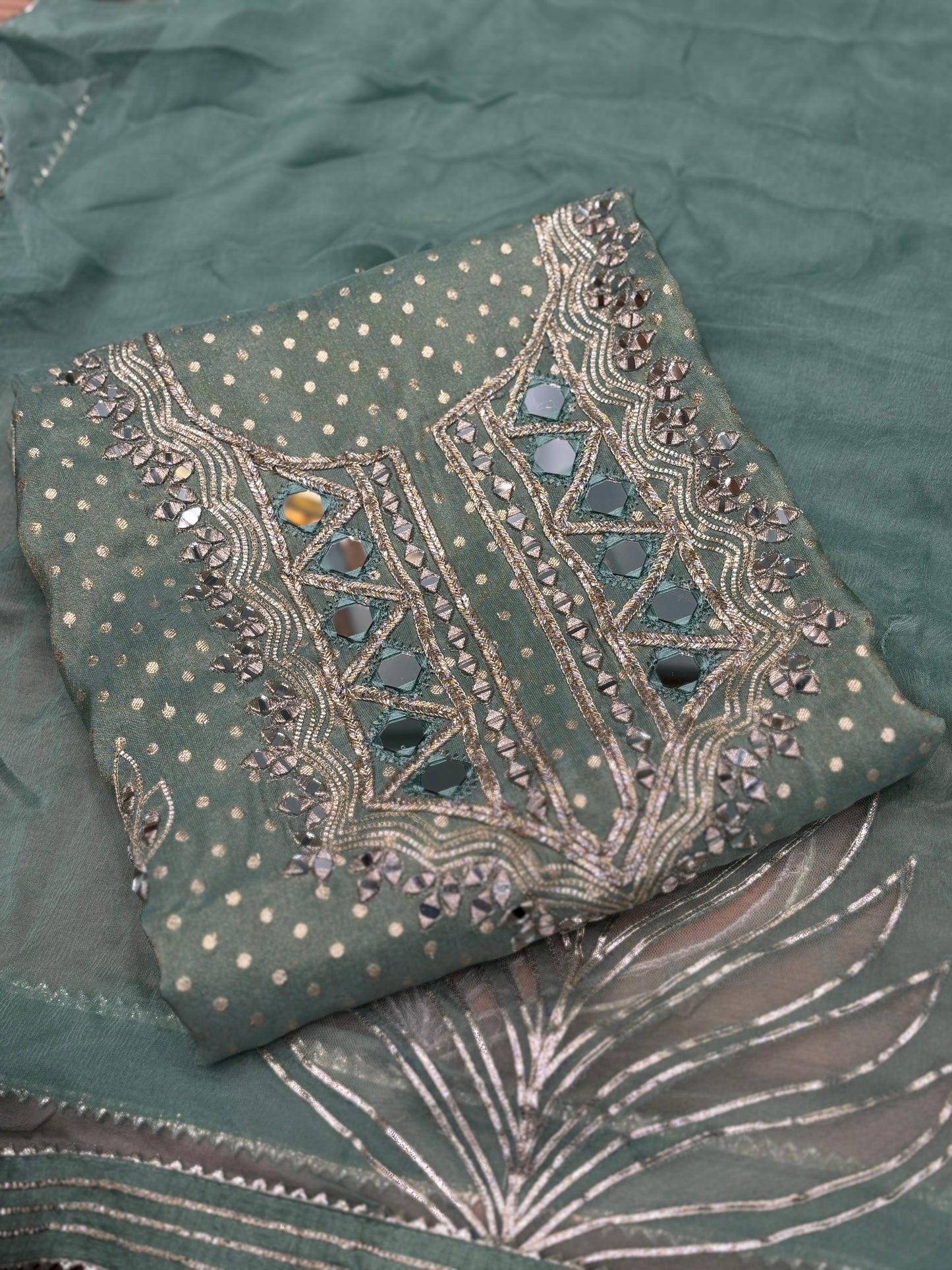 Elevate your festive wardrobe with this exquisite ensemble crafted