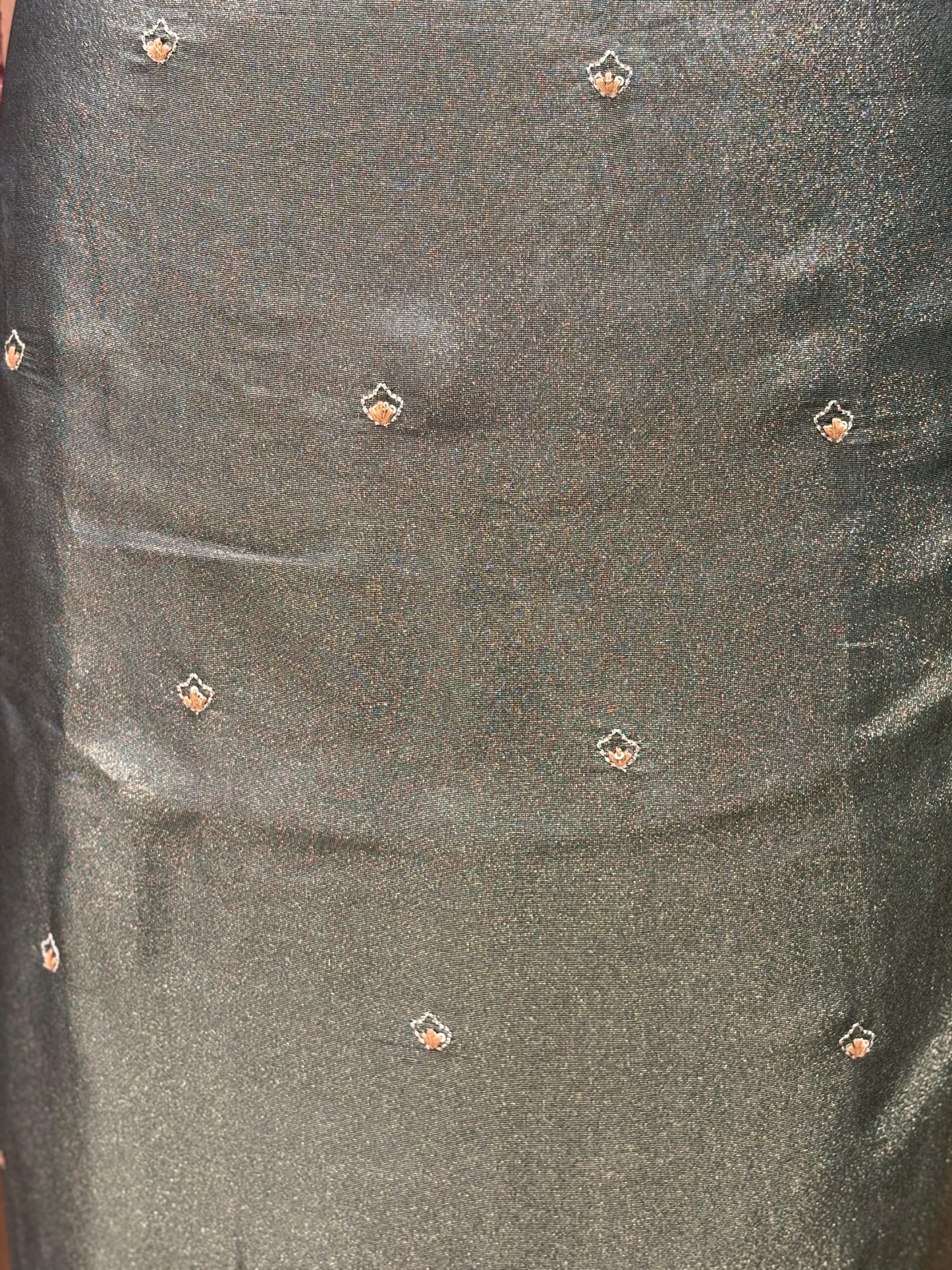 Unveil the charm of elegance with this olive green unstitched suit set