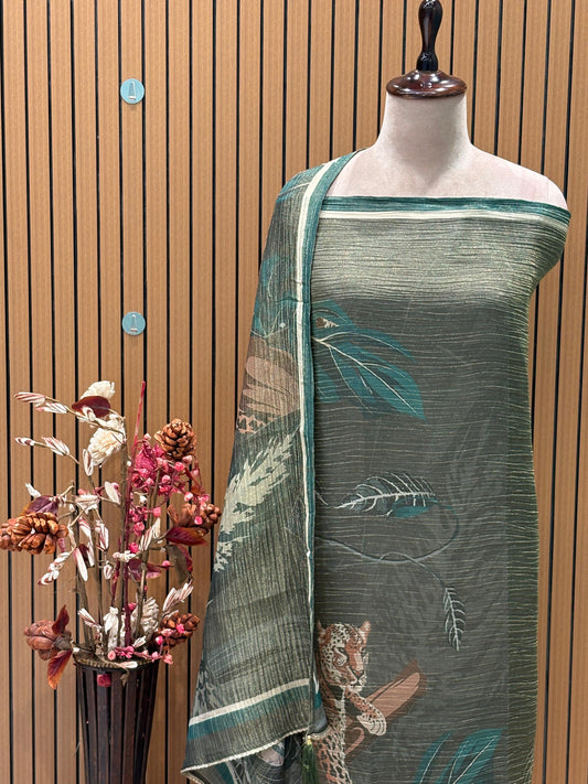 Unveil the charm of elegance with this olive green unstitched suit set