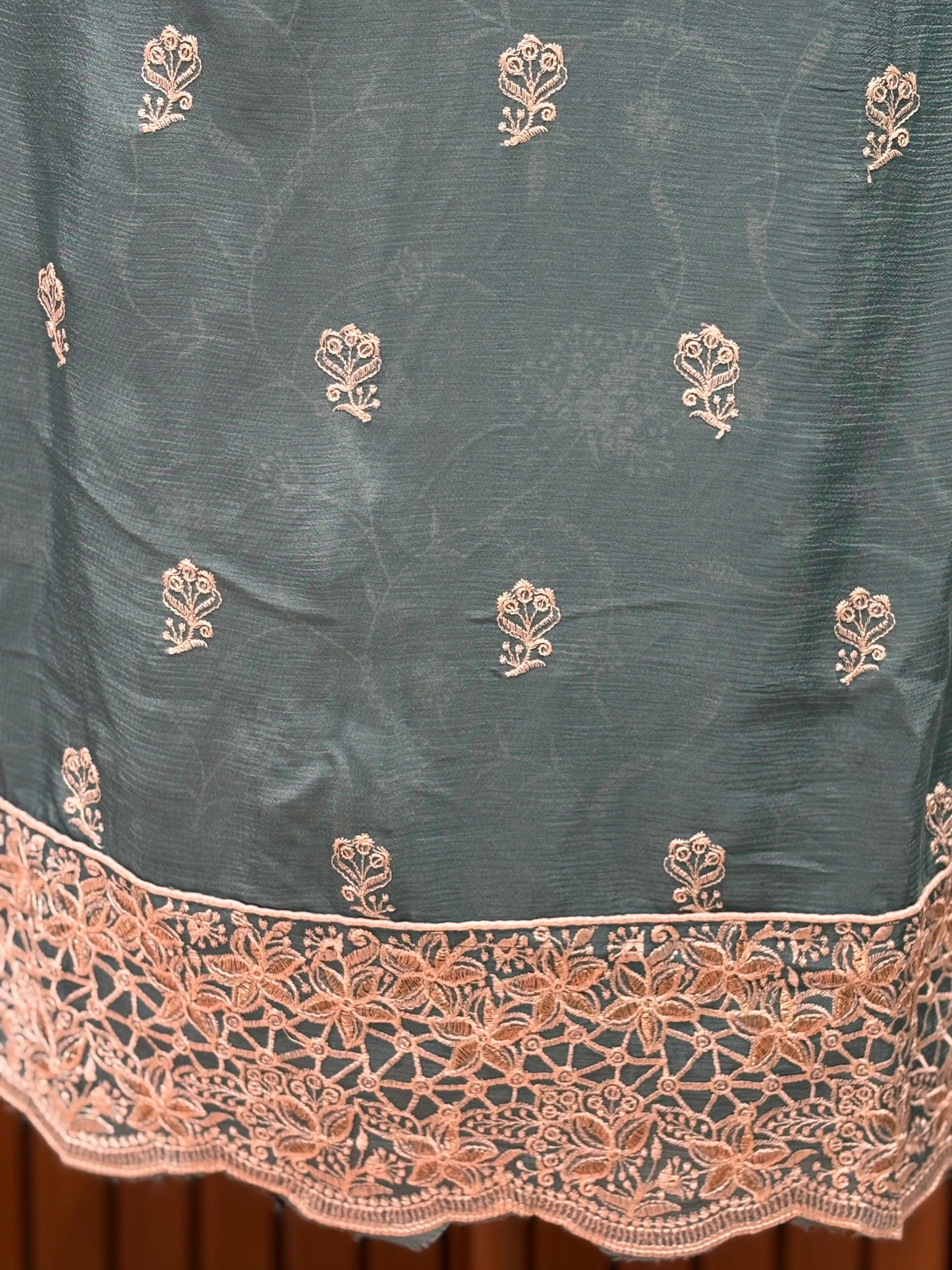 Elevate your festive wardrobe with this exquisite unstitched suit set