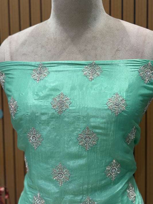 Step into elegance with this luxurious unstitched suit set