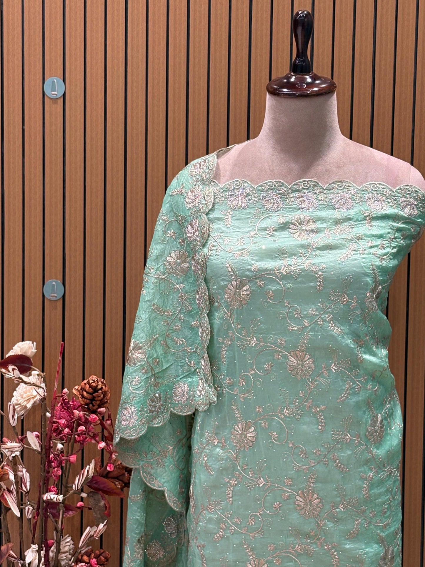 Step into elegance with this luxurious unstitched suit set