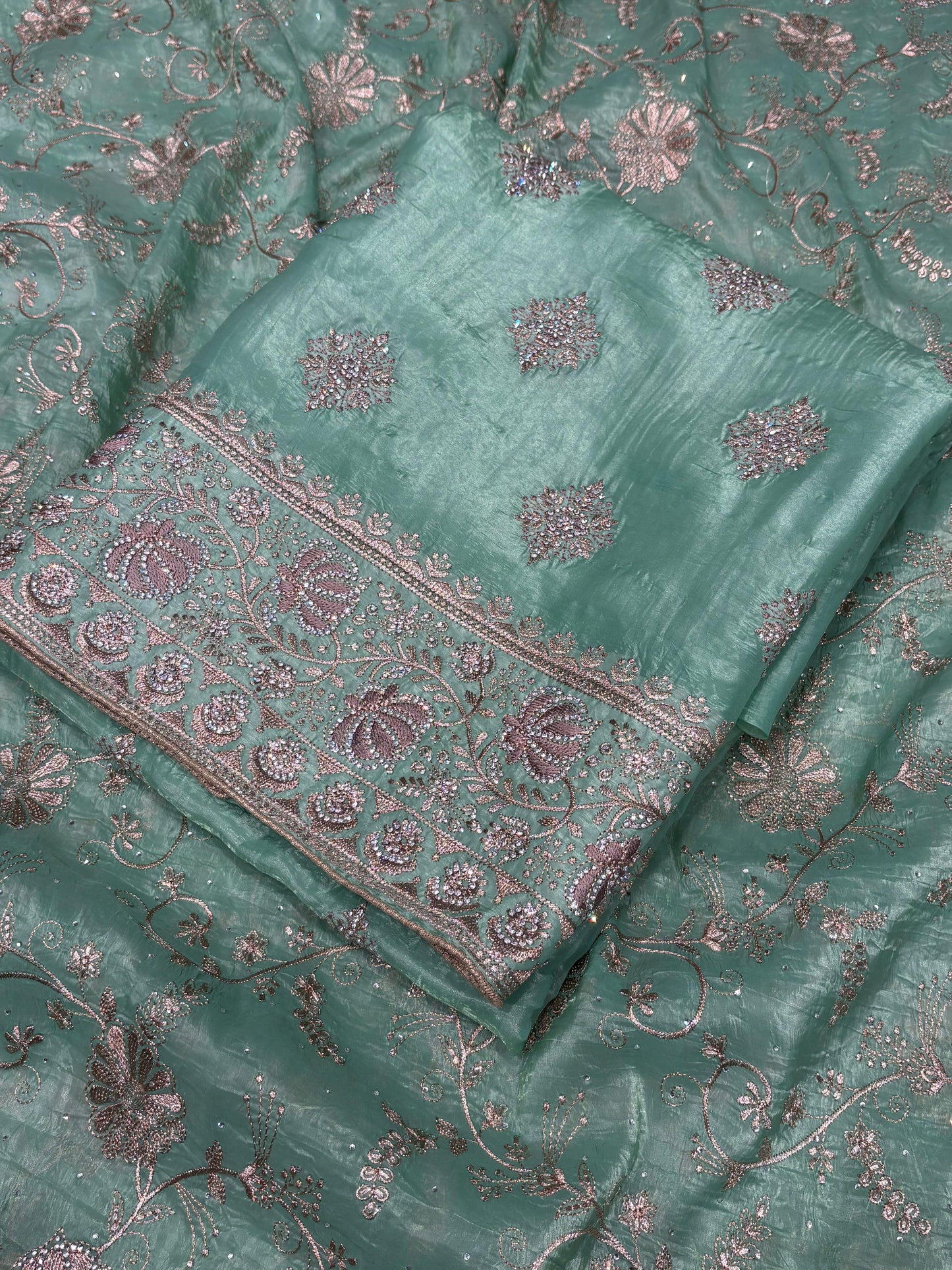 Step into elegance with this luxurious unstitched suit set
