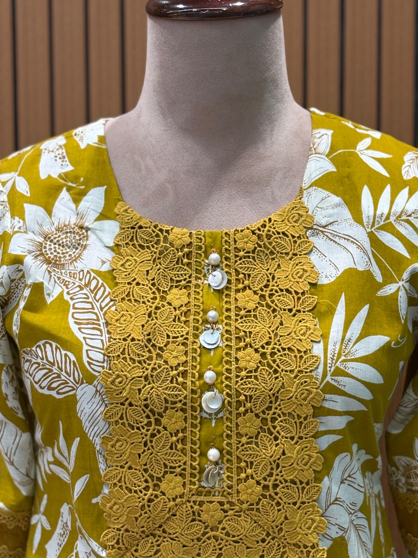Embrace festive charm with this mustard floral print suit