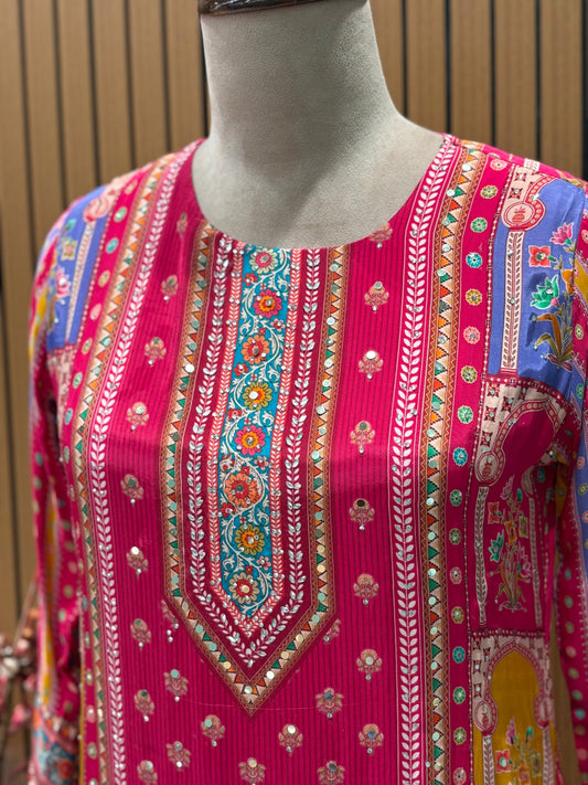 Brighten your wardrobe with this vibrant pink printed kurti