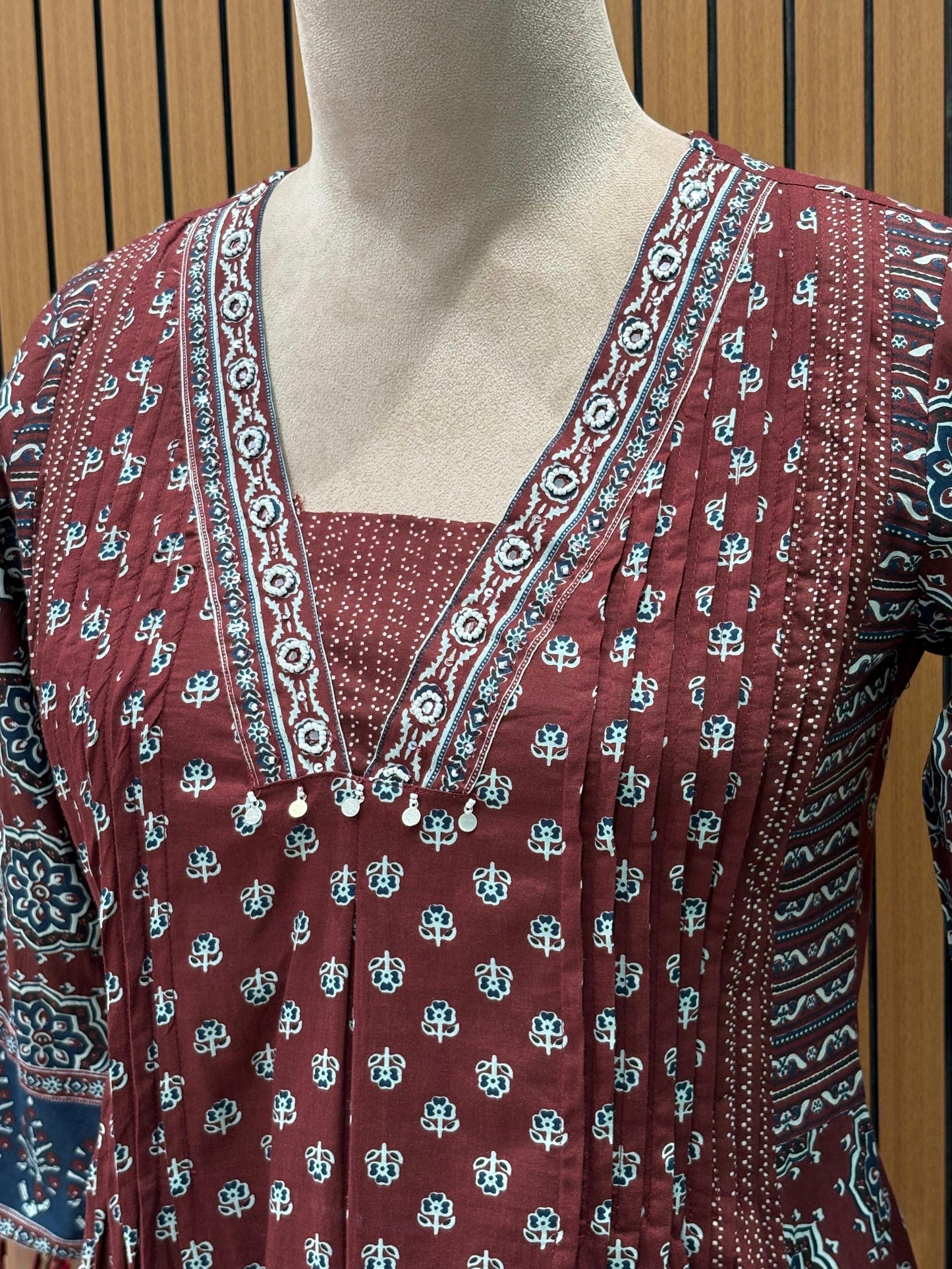 Elevate your everyday style with this maroon A-line cotton kurti set