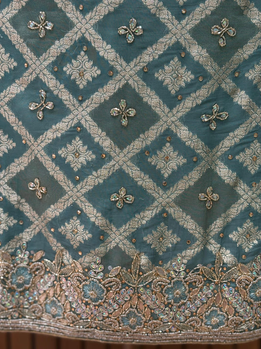 Celebrate this festive season in royalty with our exquisite unstitched suit set.