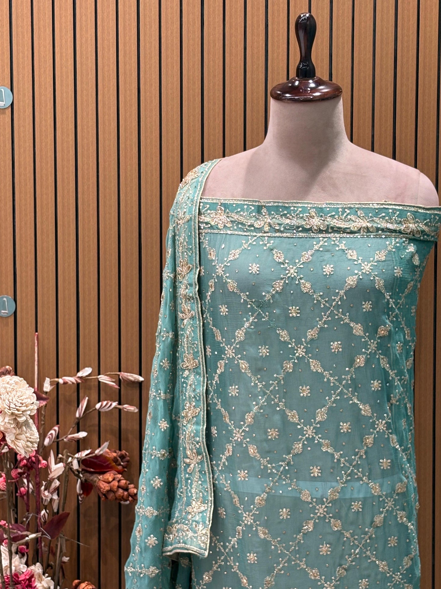 Celebrate this festive season in royalty with our exquisite unstitched suit set.