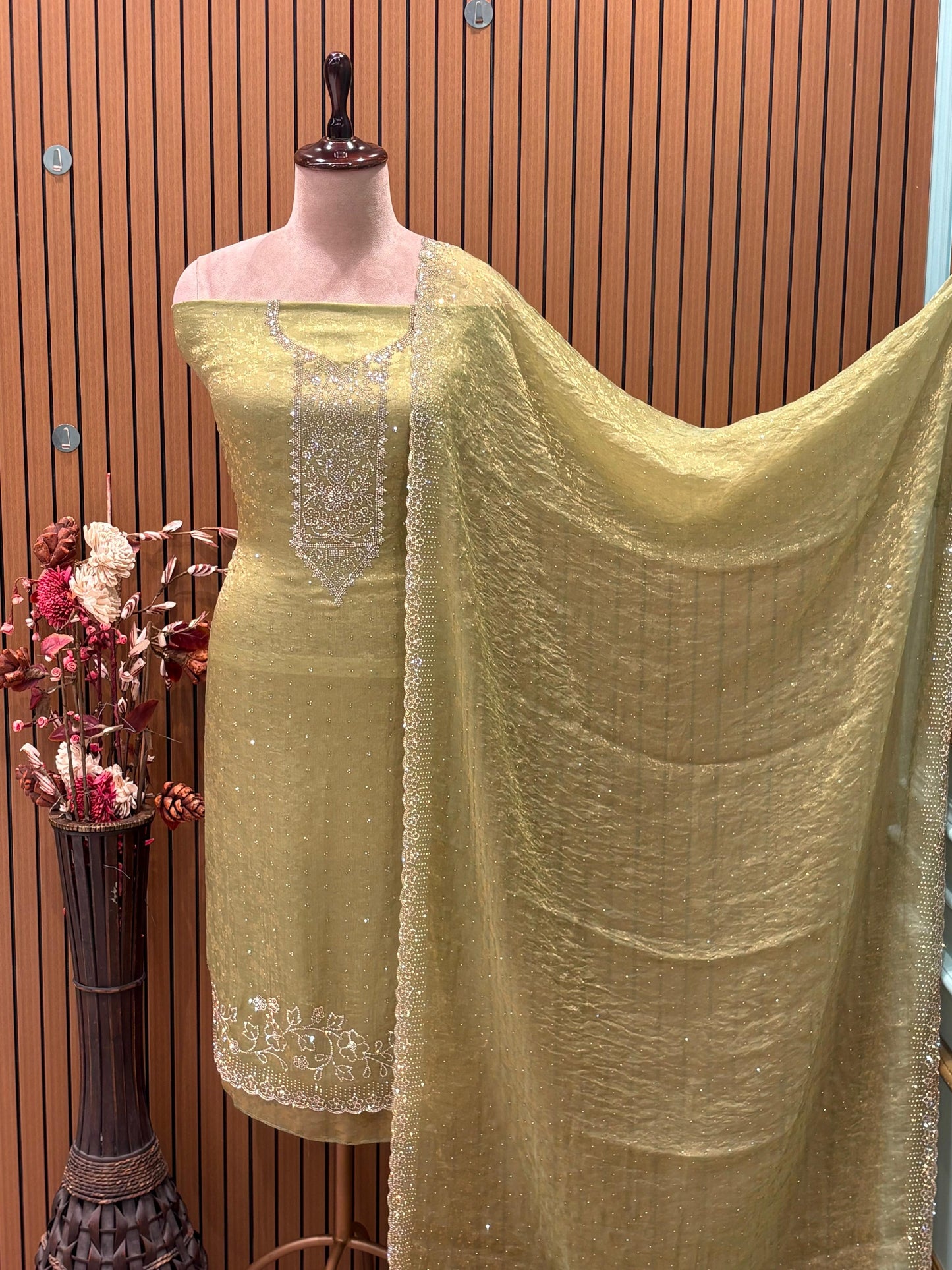 Unveil festive elegance with this stunning unstitched suit