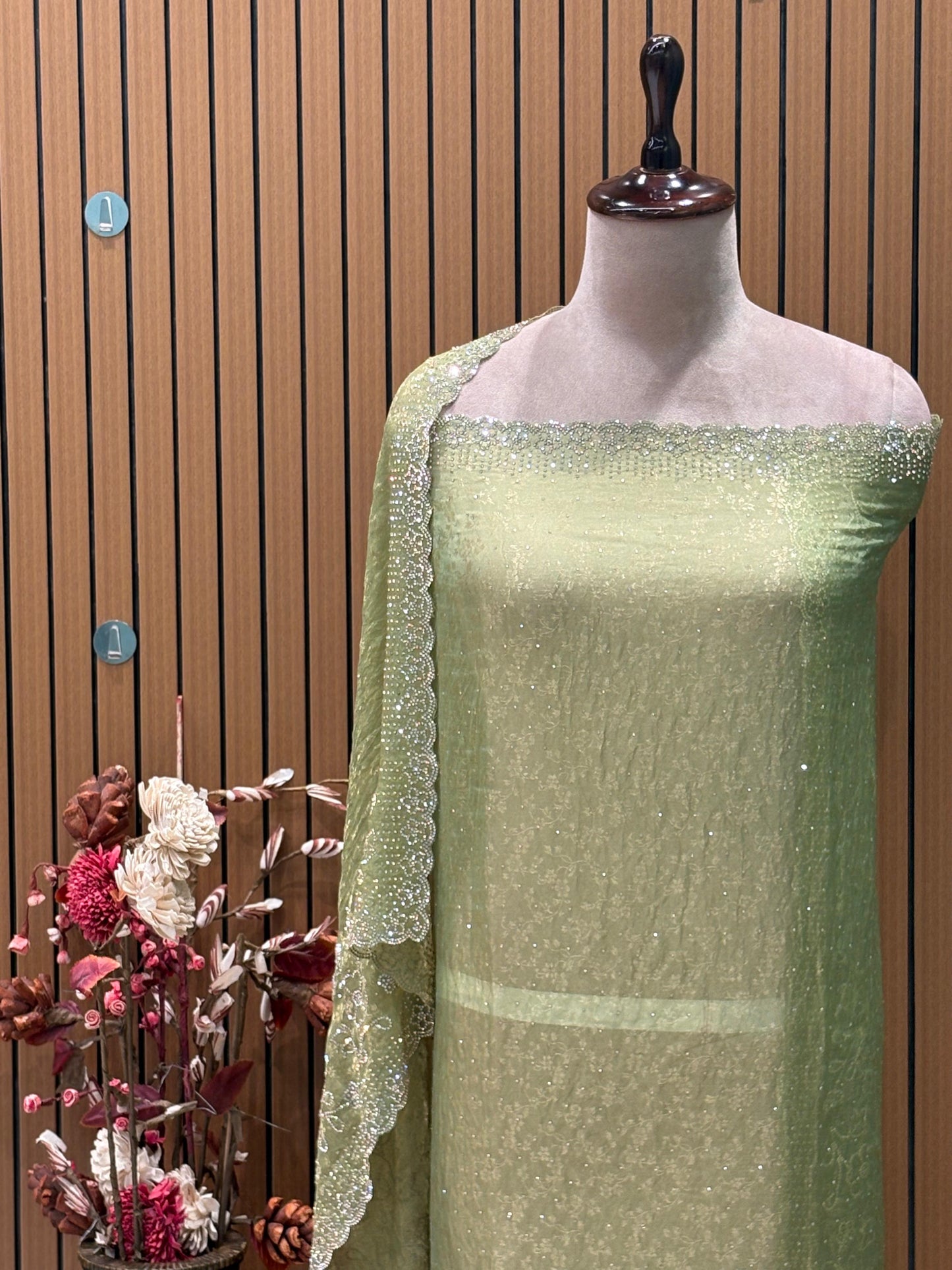 Unveil festive elegance with this stunning unstitched suit