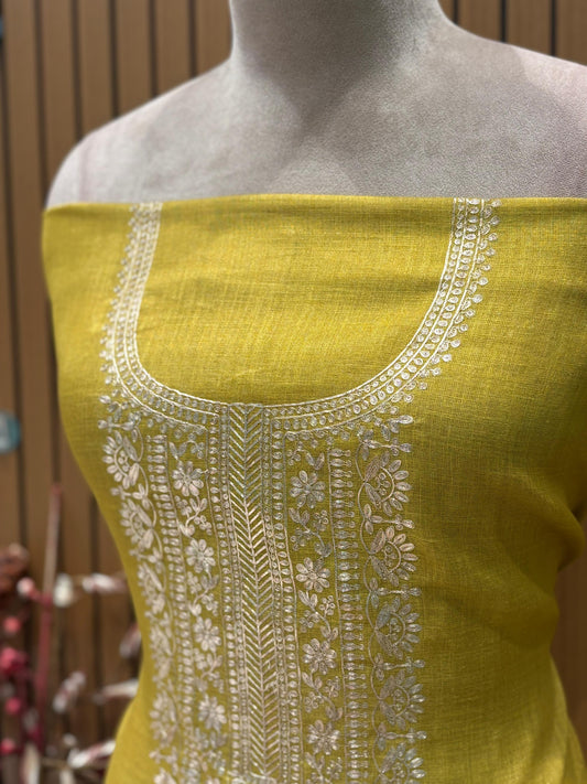 Step into festive finesse with this unstitched suit set