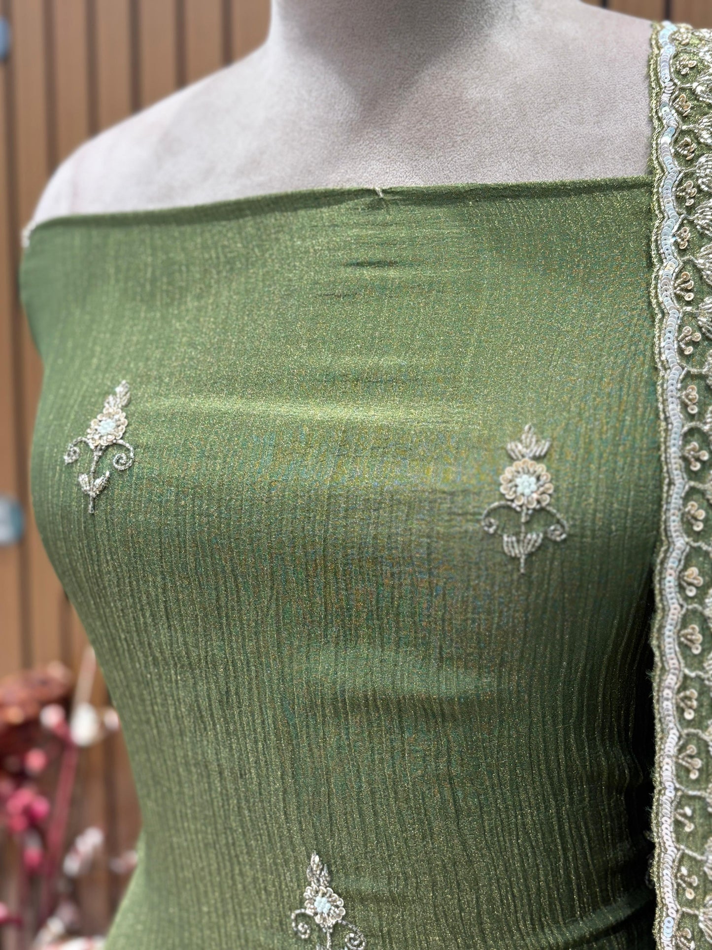 Elevate your festive style with our premium unstitched suit set