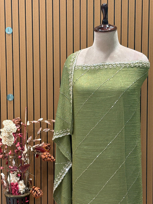 Elevate your festive style with our premium unstitched suit set