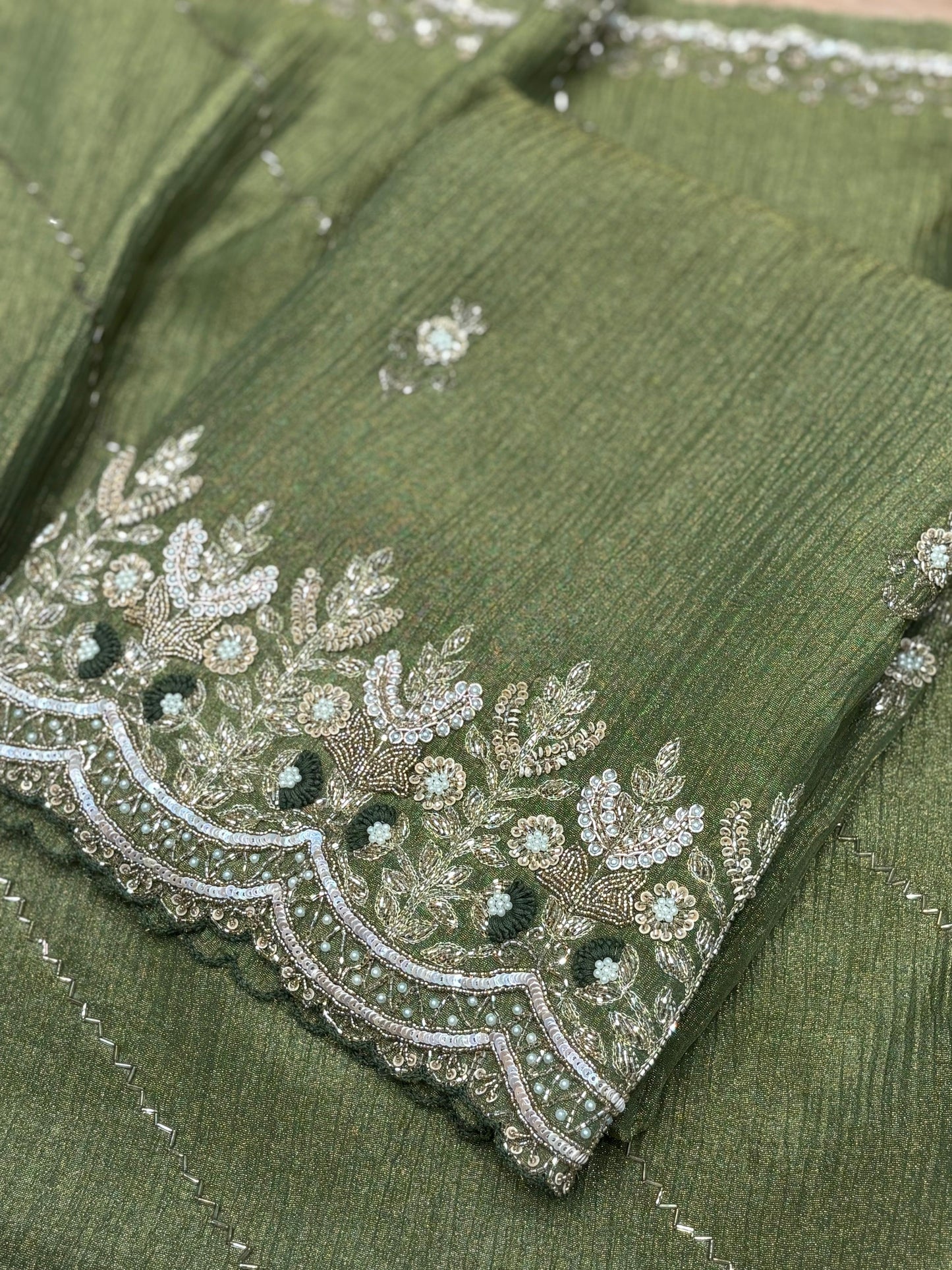 Elevate your festive style with our premium unstitched suit set