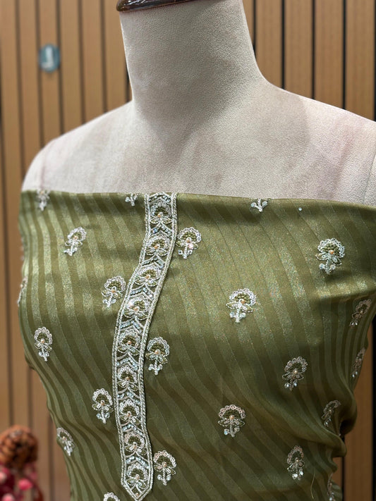 Elevate your festive wardrobe with our luxurious unstitched suit set