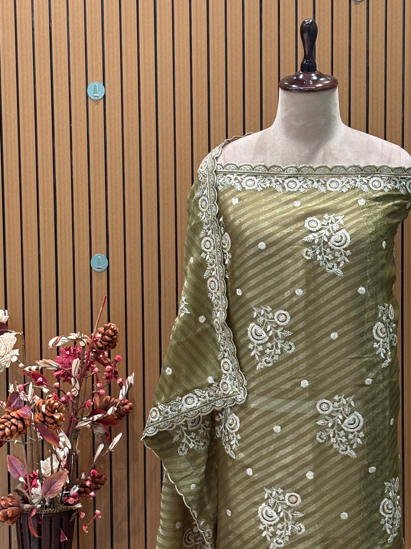 Elevate your festive wardrobe with our luxurious unstitched suit set