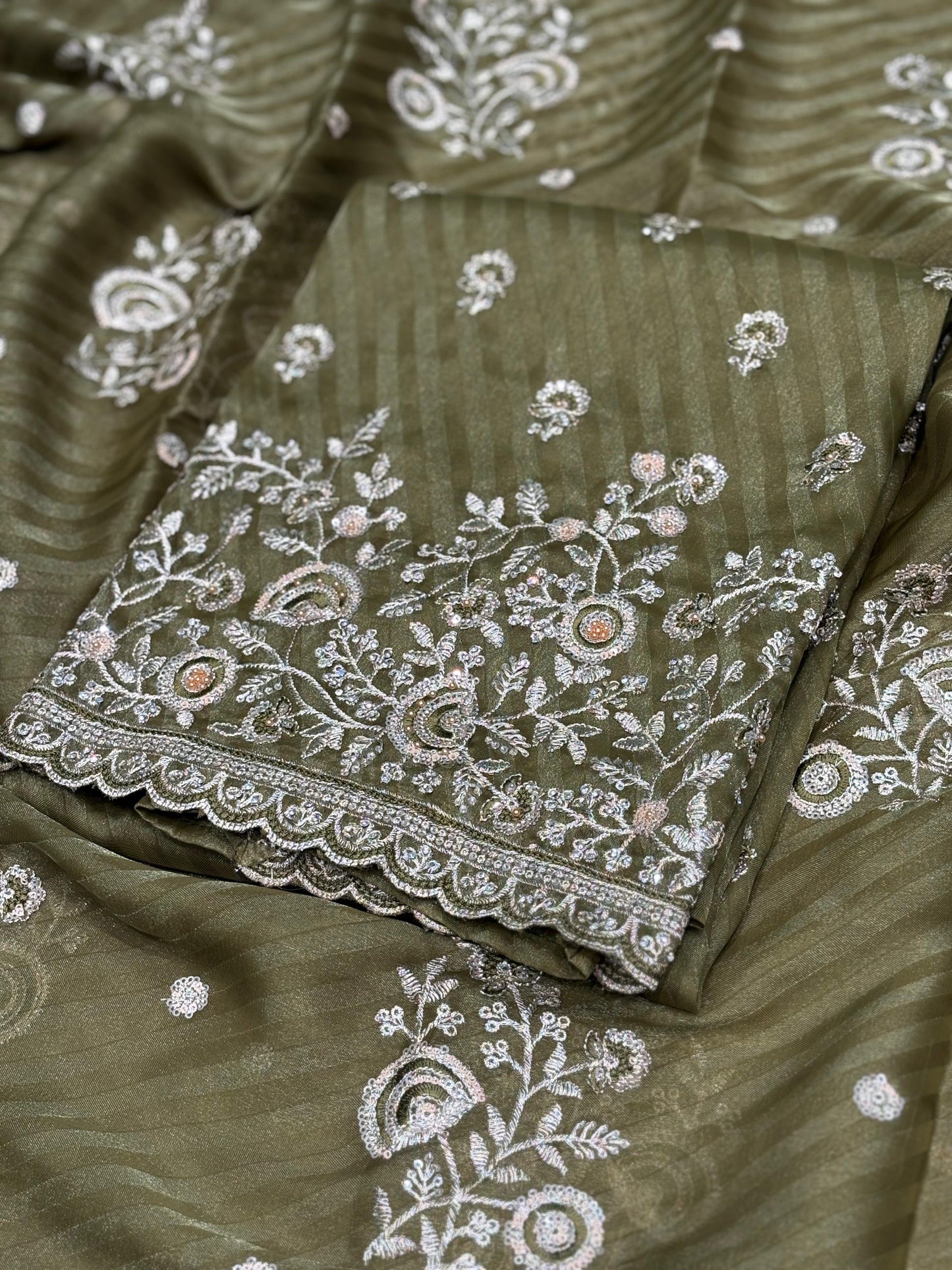 Elevate your festive wardrobe with our luxurious unstitched suit set