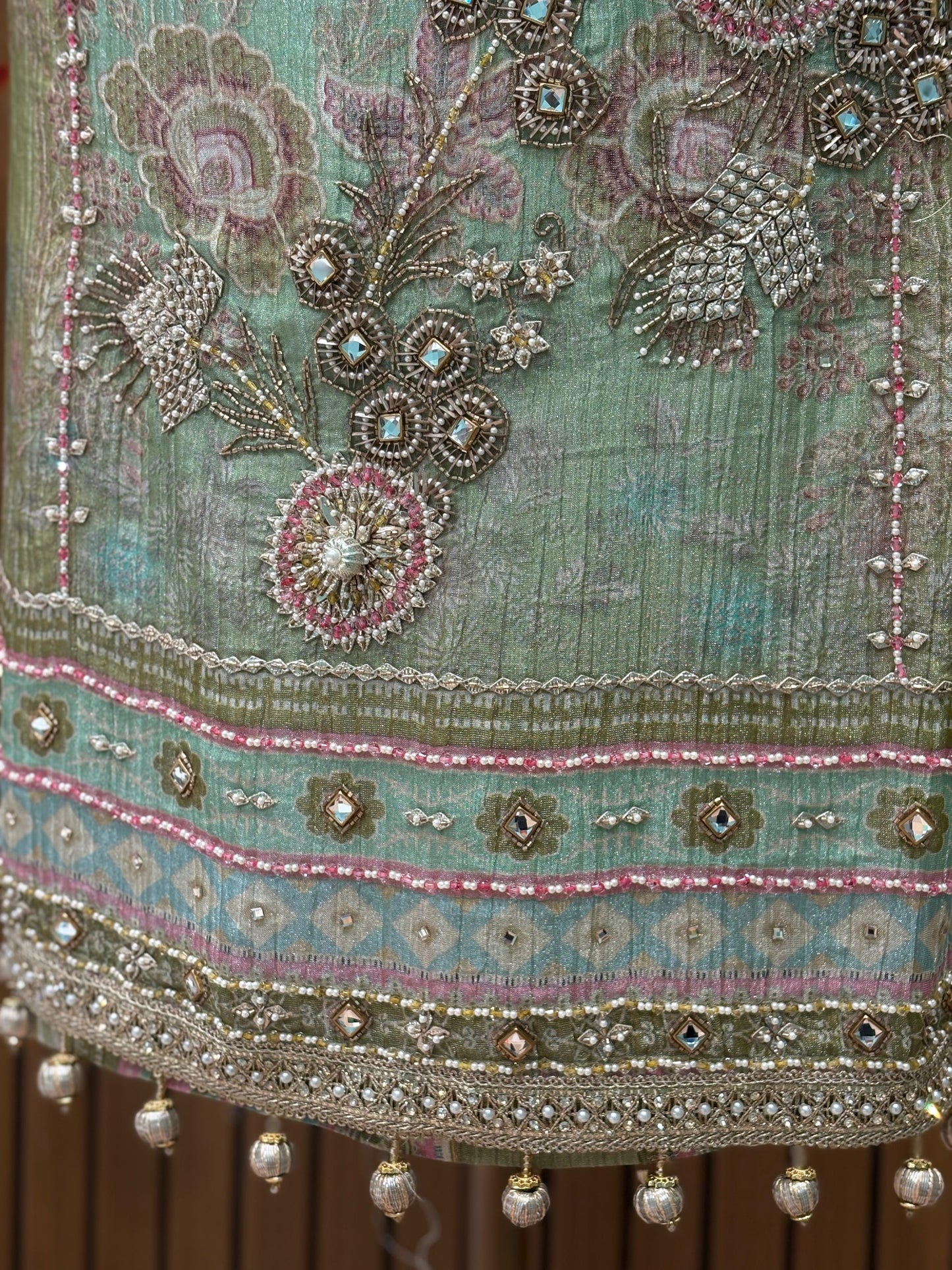 Step into elegance with this exquisite unstitched suit set