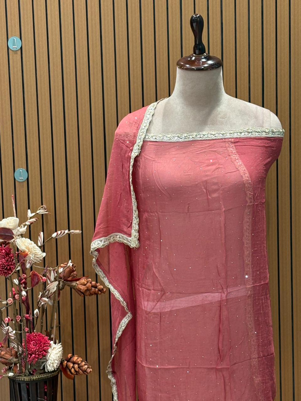 Unveil elegance with our premium unstitched suit set